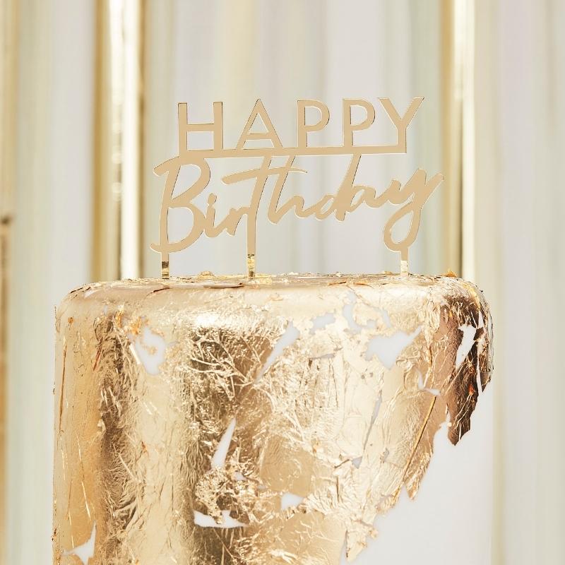Ginger Ray kaketopp i gull med teksten happy birthday