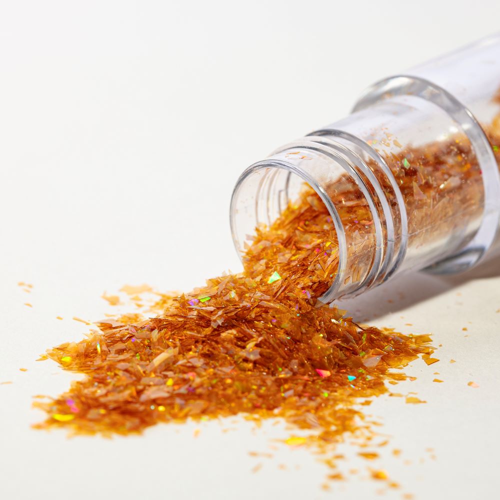 Spiselige glitterflak gull