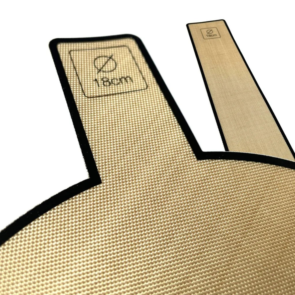 Detalj av bakepapir for Ø18cm form med håndtak og størrelsesmerking