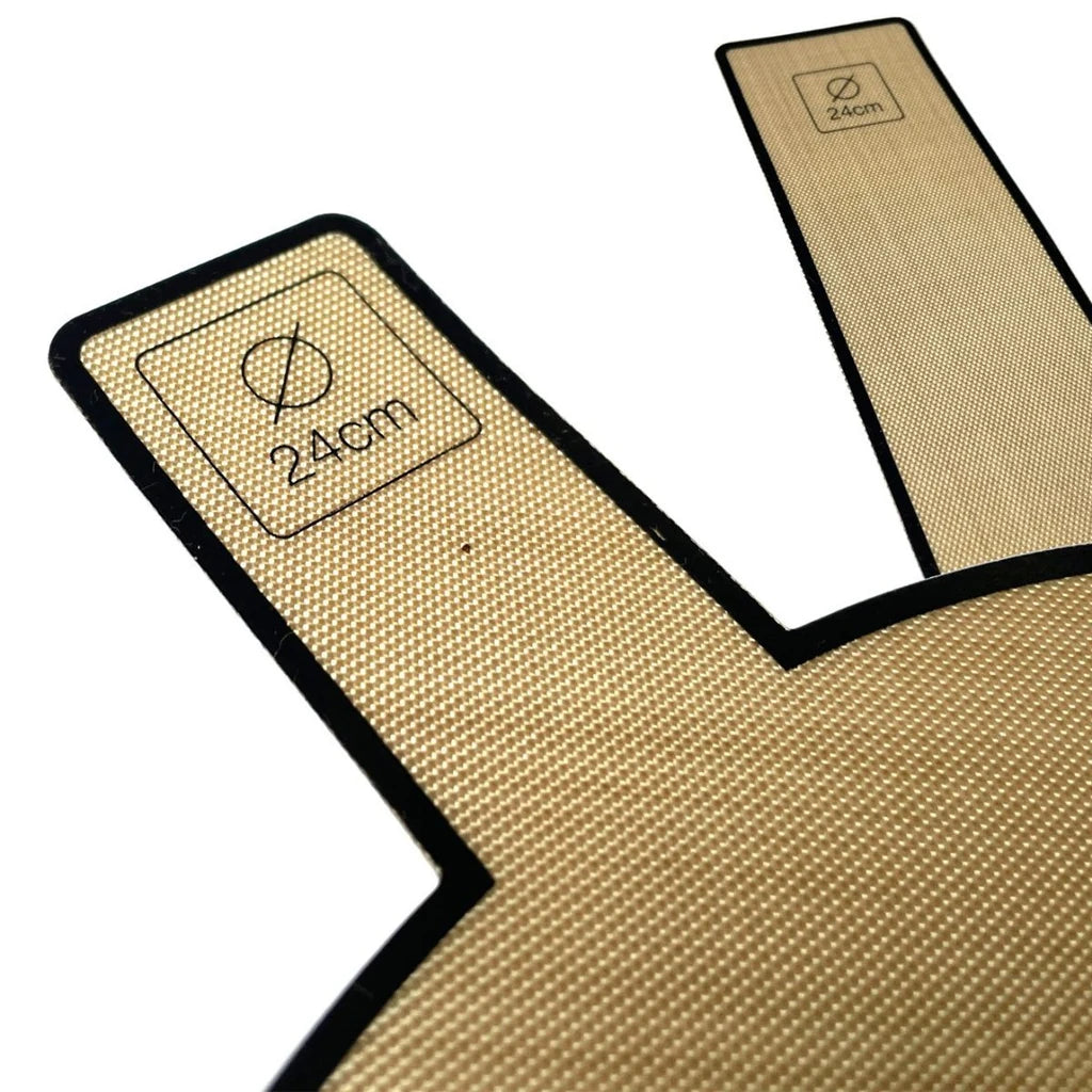Detalj av bakepapir for Ø24cm form med håndtak og størrelsesmerking