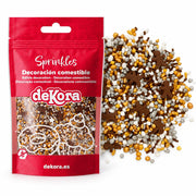 deKora Ginger Glow kakestrøssel, 100 g, pakning med nærbilde av strøsselet