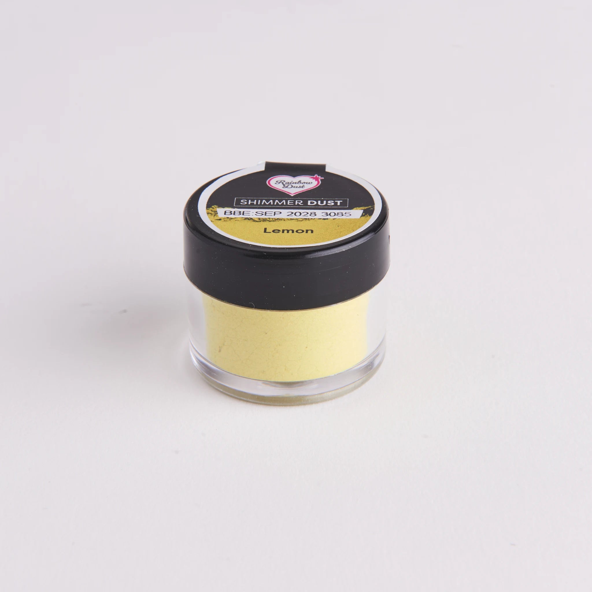 Rainbow Dust Shimmer Dust Lemon – liten klar plastboks med svart lokk