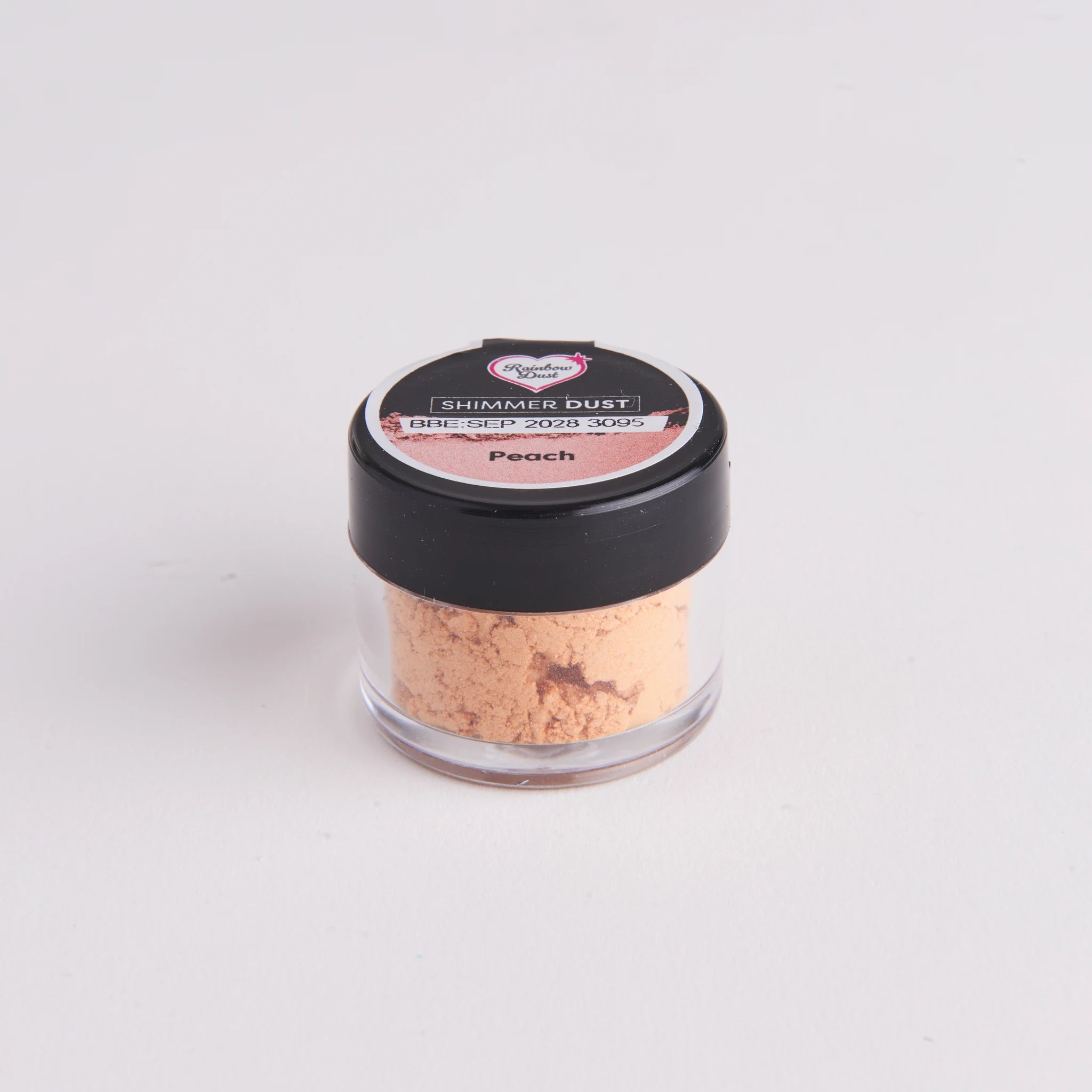 Rainbow Dust Shimmer Dust fersken – liten klar boks med svart lokk og rosa-oransje pulver
