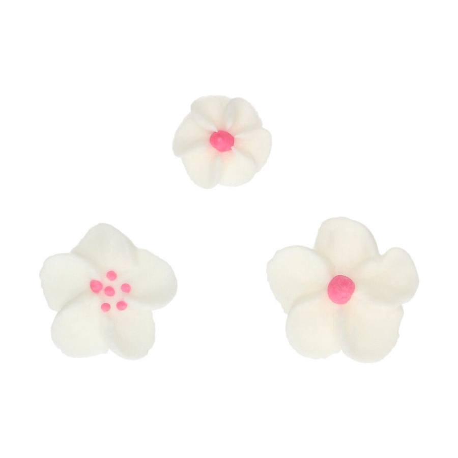 spiselig kakepynt av hvite og rosa blomster