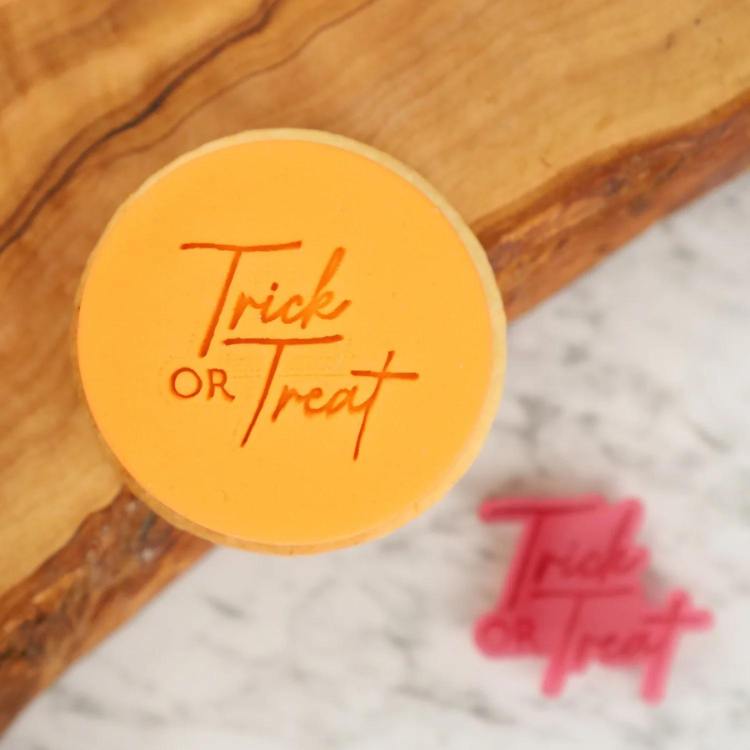 sweet stamp embosser trick or tramp