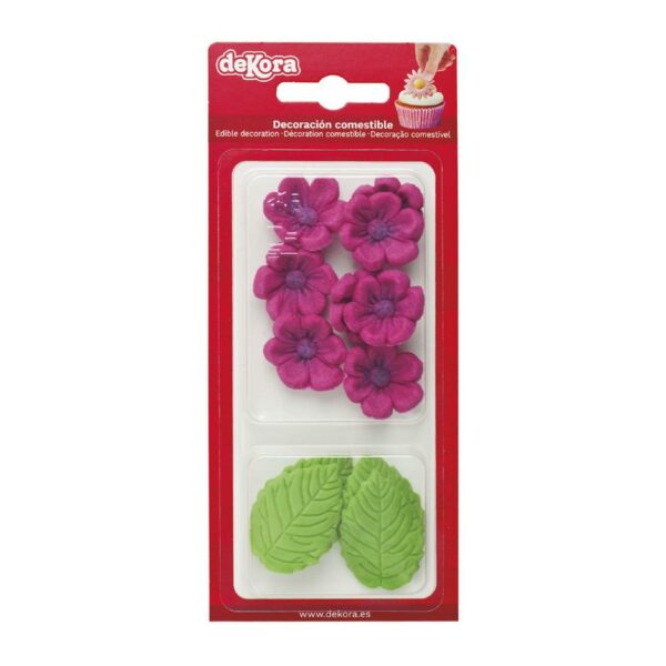 dekora spiselige rosa blomster og grønne blad